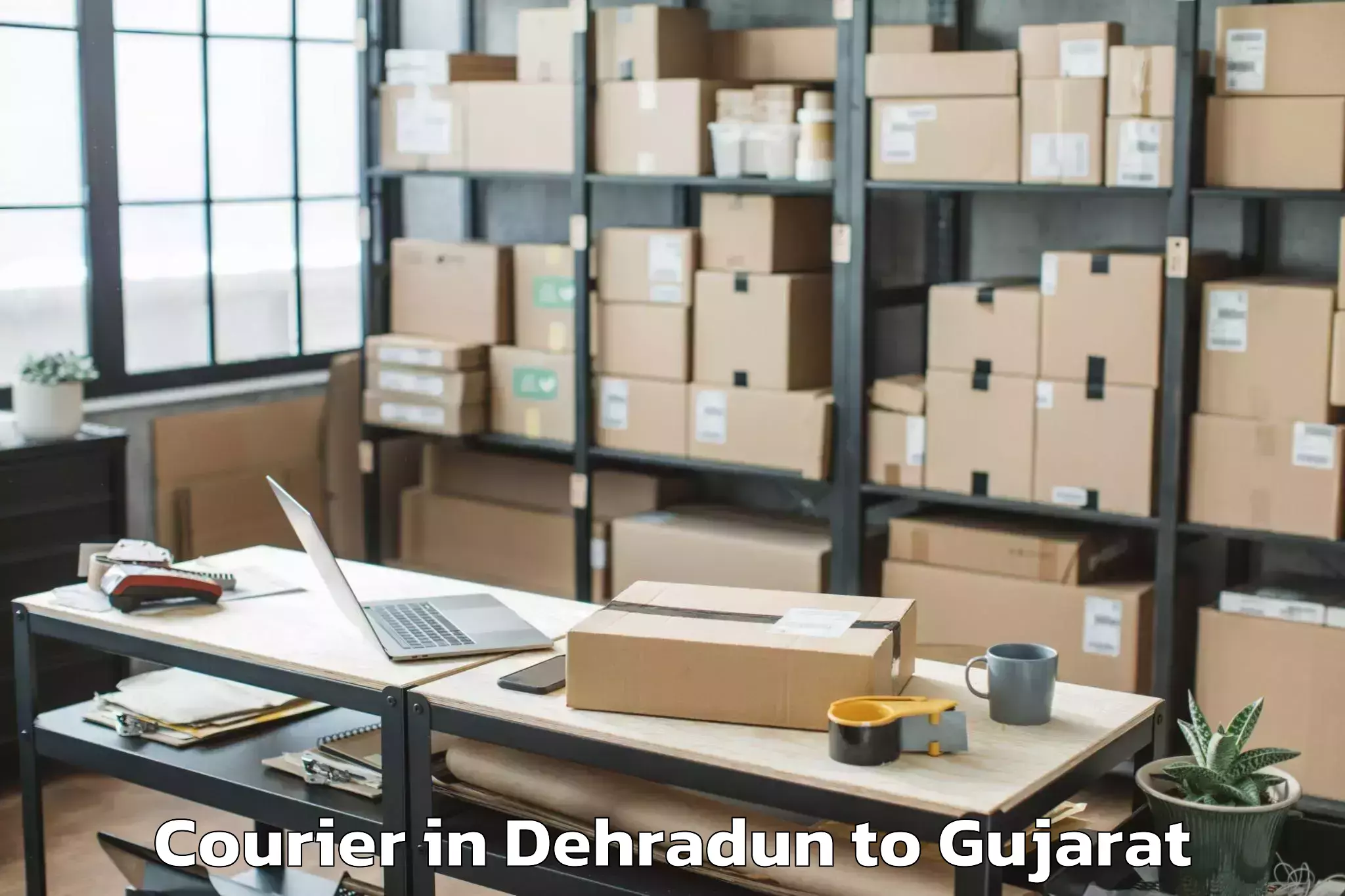 Easy Dehradun to Dhandhuka Courier Booking